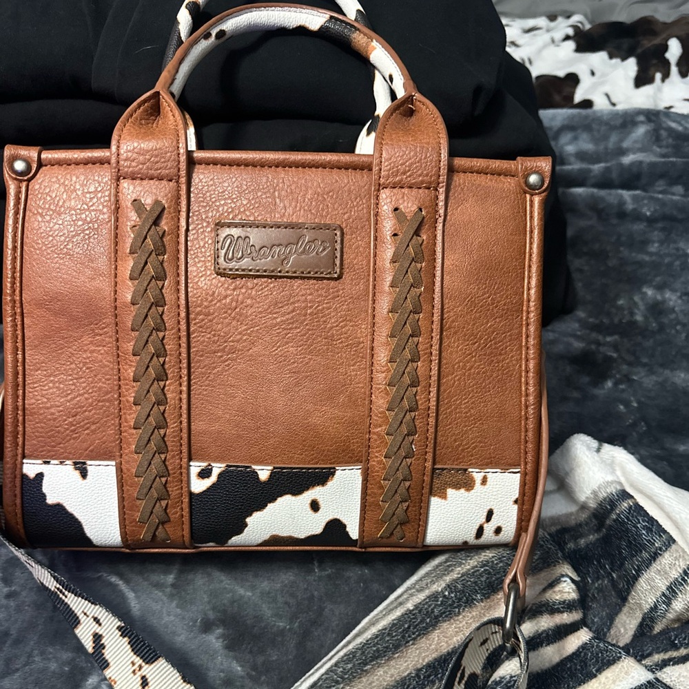 Cow print wrangler purse